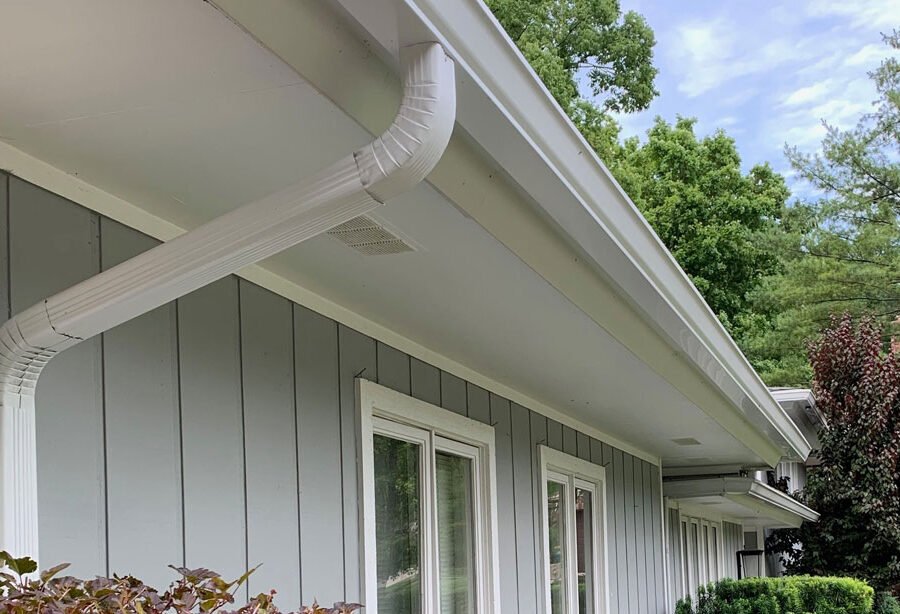 How Gutter Guards, Downspouts, and Professional Installation Work Together