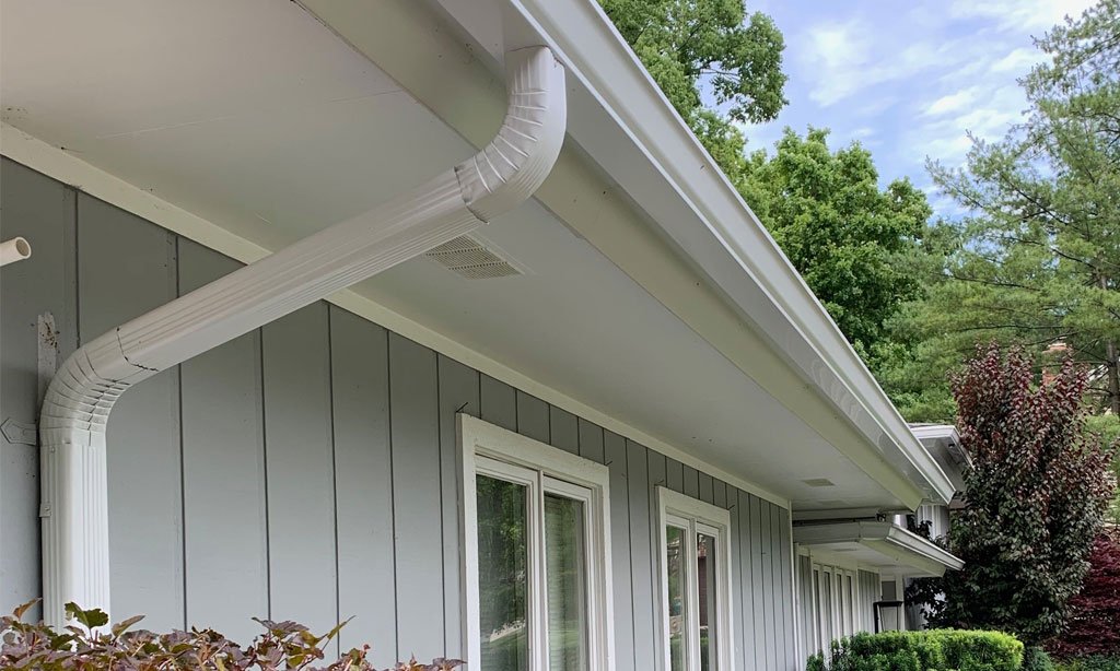 How Gutter Guards, Downspouts, and Professional Installation Work Together